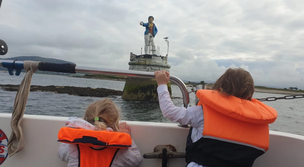 Kids enjoying sightseeing and Seal watching during trip