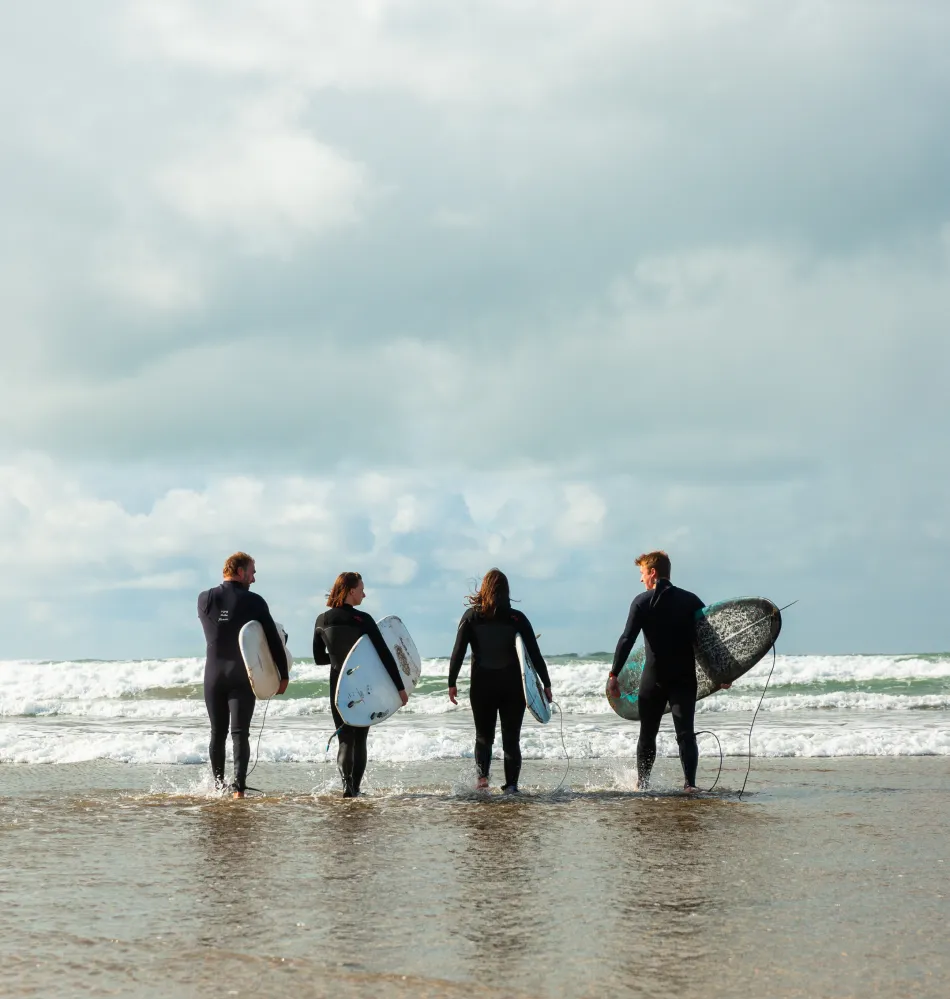 Group of people enjoying Surfing